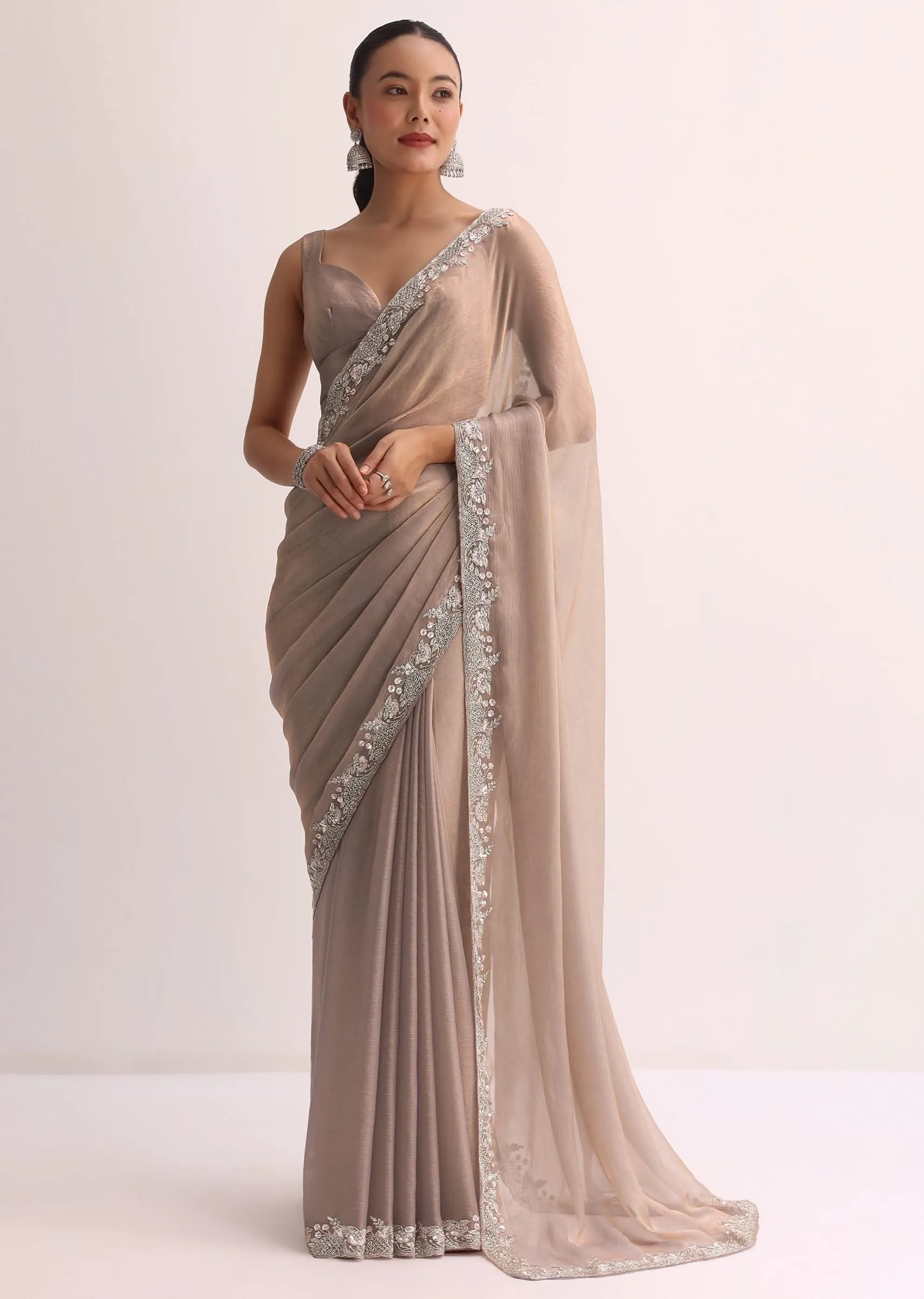 Beige Saree With Embroidered Border And Unstitched Blouse