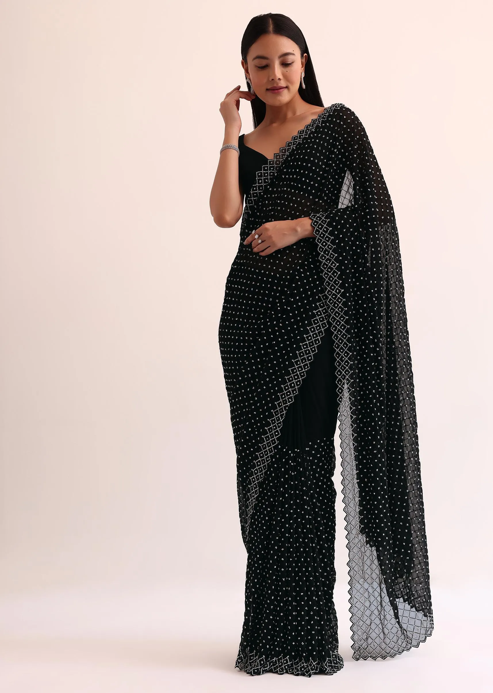 Black Georgette Saree With Stone Embroidery And Unstitched Blouse