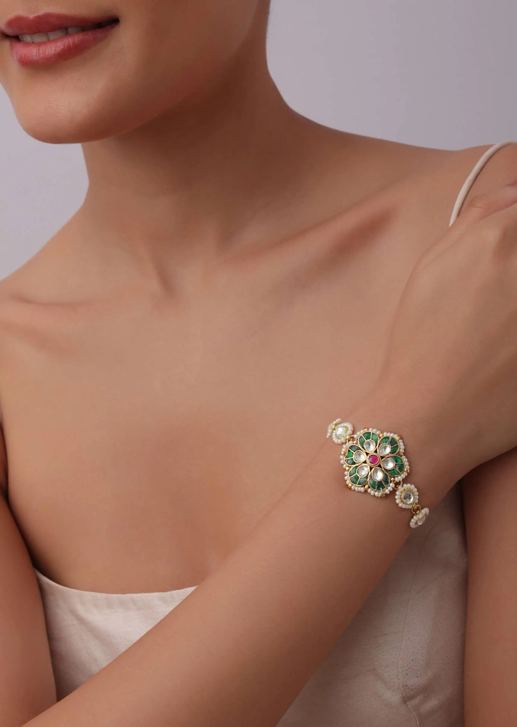 Gold Finish Green Kundan Bracelet With Meenakari And Pearls