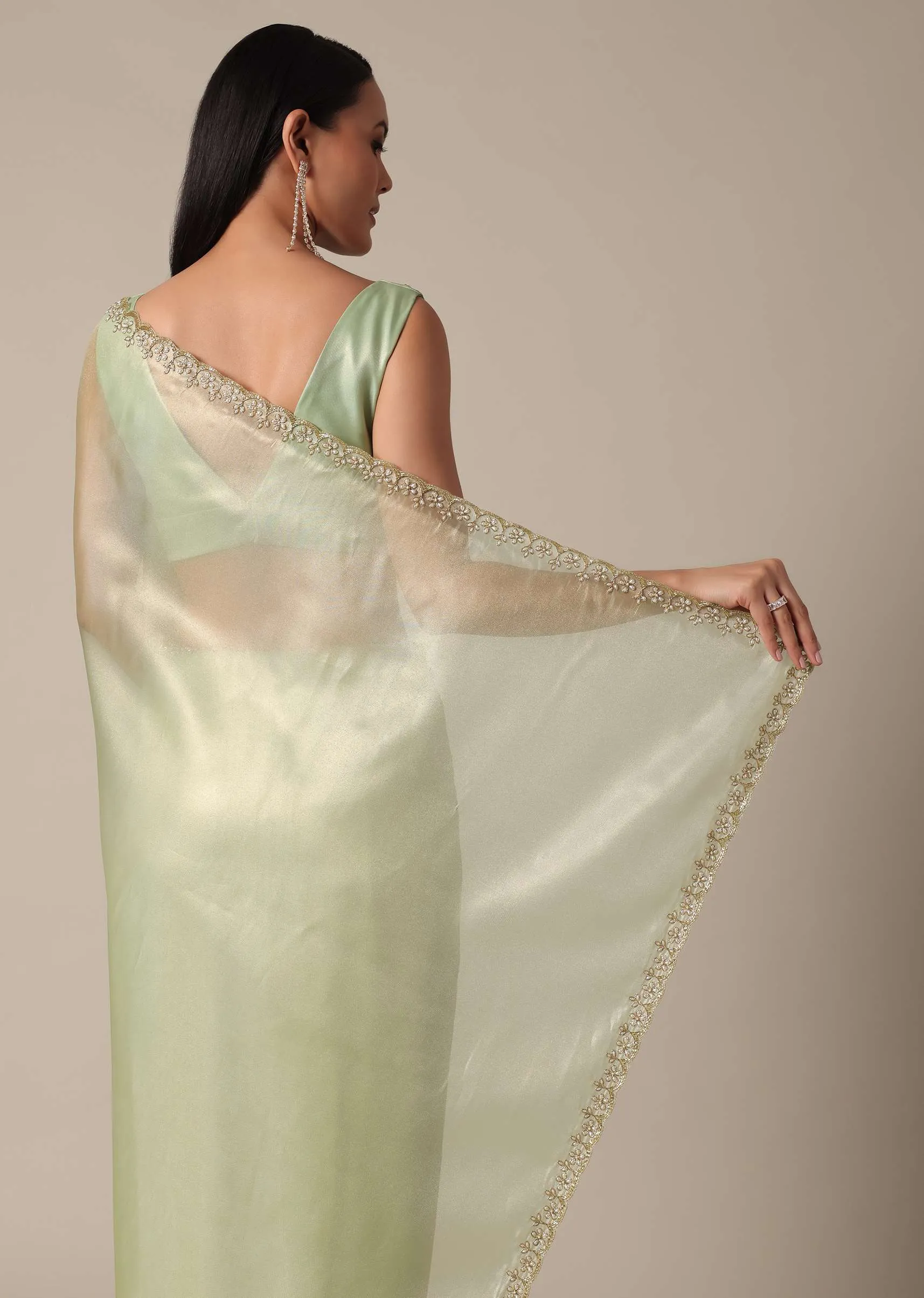 Graceful Green Saree With Scalloped Border